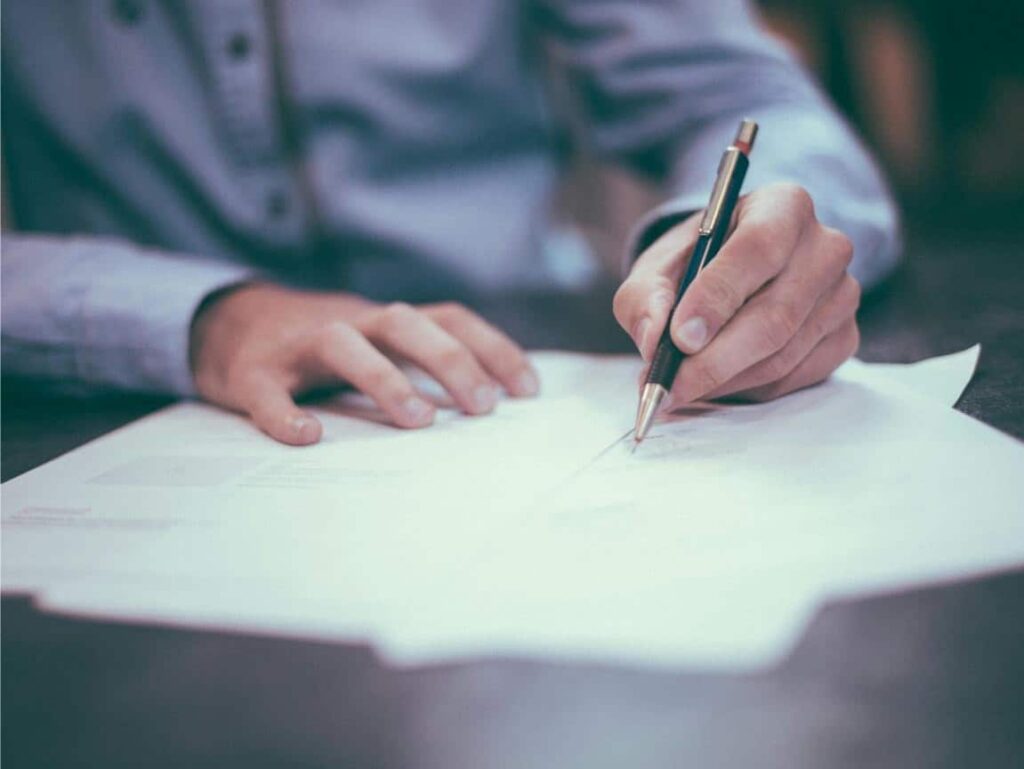 Reputable breeder explaining puppy care to a new dog owner